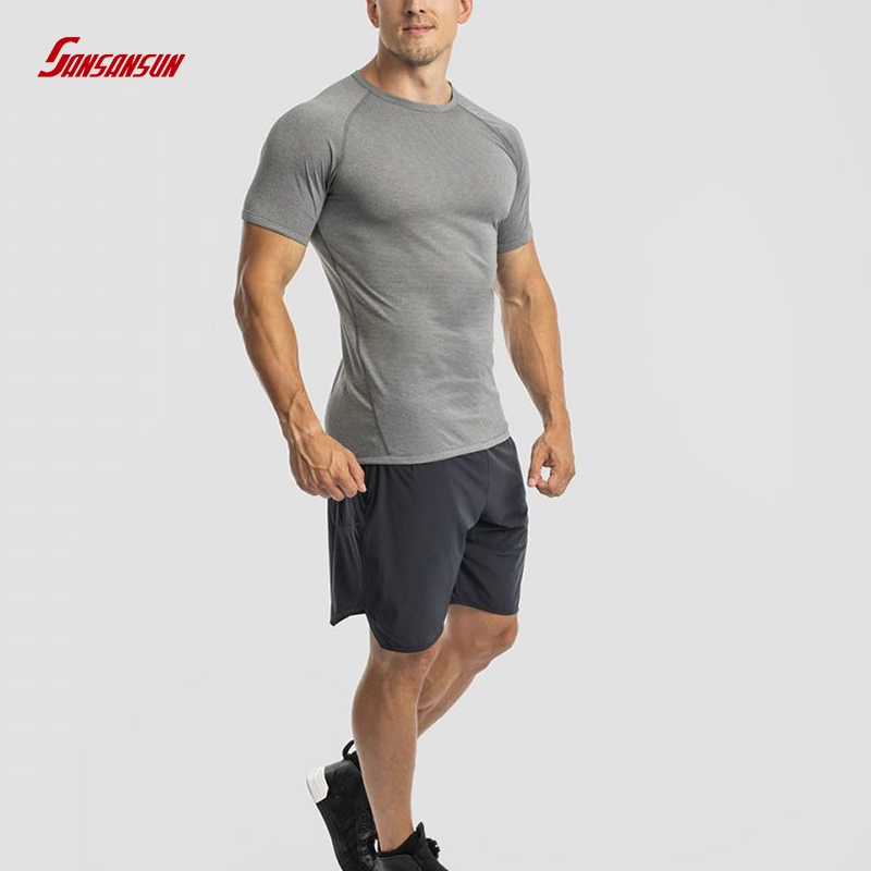 Camicie da palestra attillate per fitness da uomo in tessuto sportivo professionale