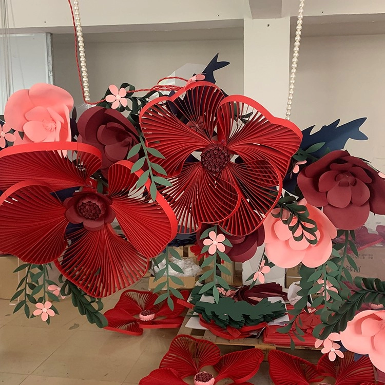 Esposizione di oggetti di scena di fiori di carta per finestre di Natale