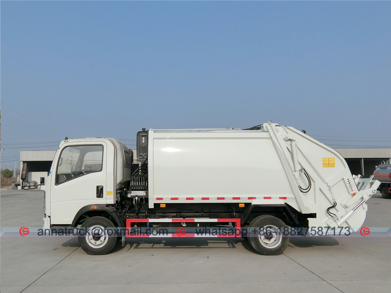 HOWO RHD 6cbm Compactor Garbage Truck - Right Side