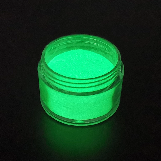 Polvere verde fluorescente luminosa ad assorbimento rapido che si illumina al buio