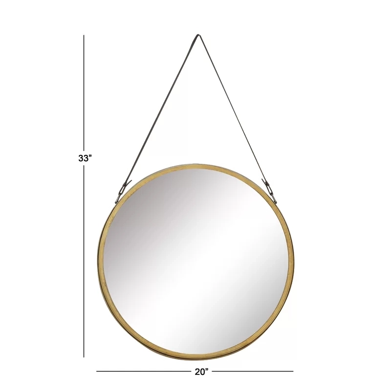 Specchio da parete con cintura in metallo dorato