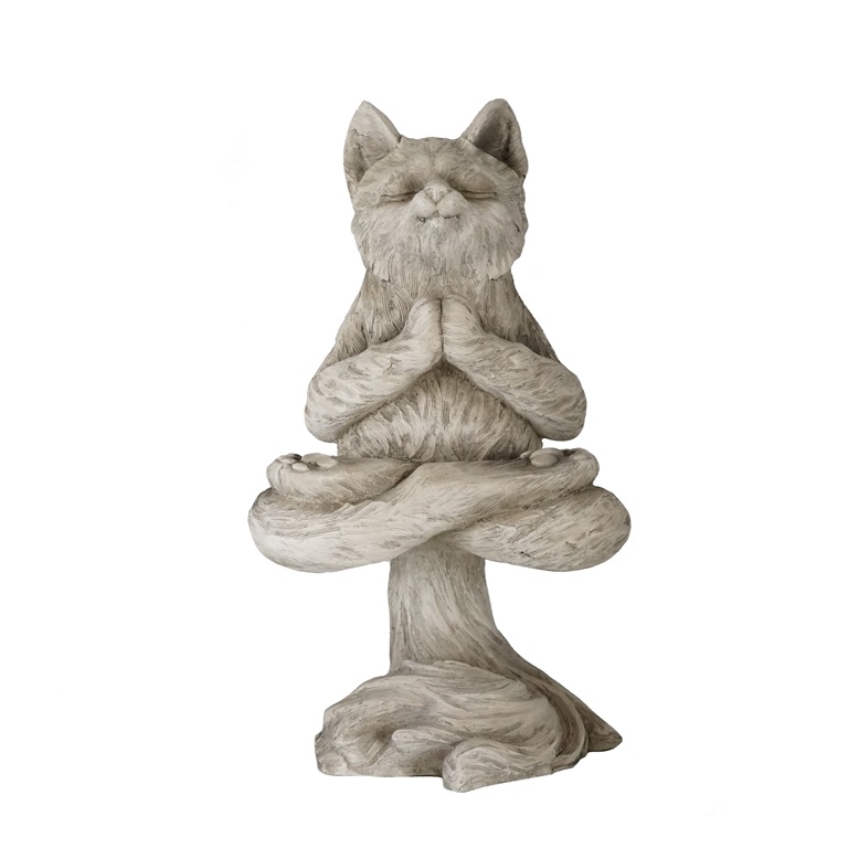 statua del gatto in meditazione