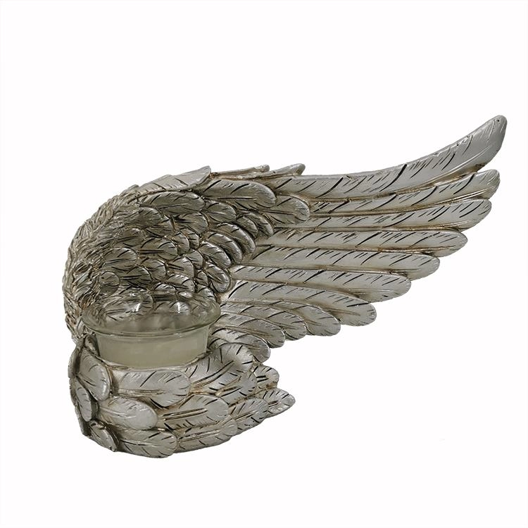 Portacandele in resina argento con ali d'angelo