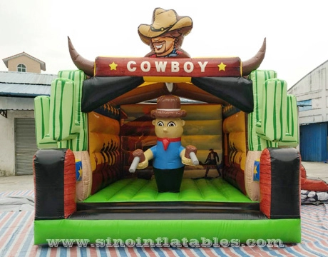 Castello gonfiabile gonfiabile per bambini cowboy western 6x5m con scivolo stampato digitalmente completamente per feste per bambini all'aperto